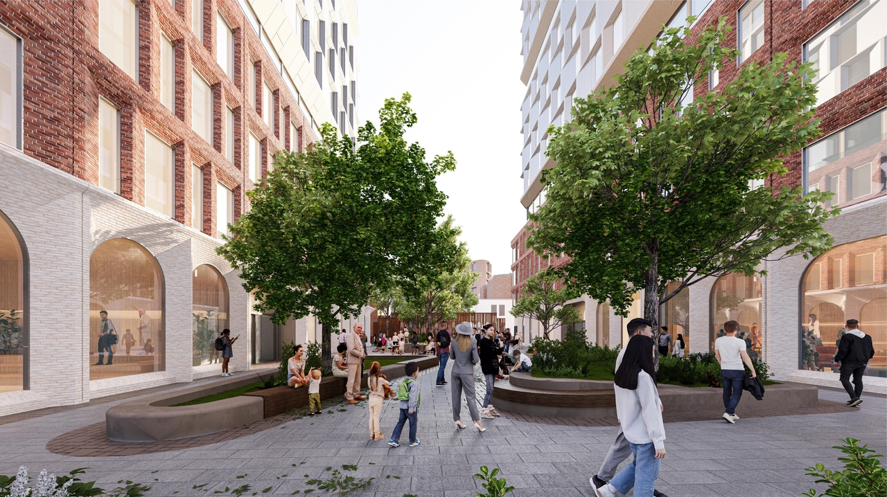 Rendering of building from page 32 of the file '2025-09-03 - SDRP Design Brief - Package 3 - D01-01-20-0019'