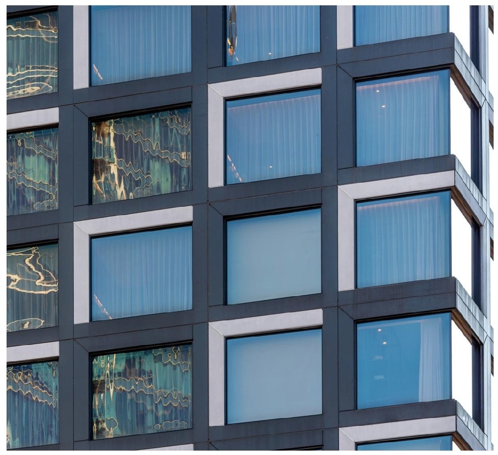 Rendering of building from page 10 of the file '2025-11-26 - UDRP Report - D01-01-24-0026'