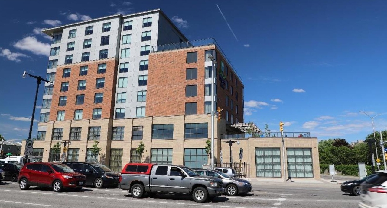 Rendering of building from page 7 of the file '2021-08-23 - Design Brief - D07-12-21-0128'