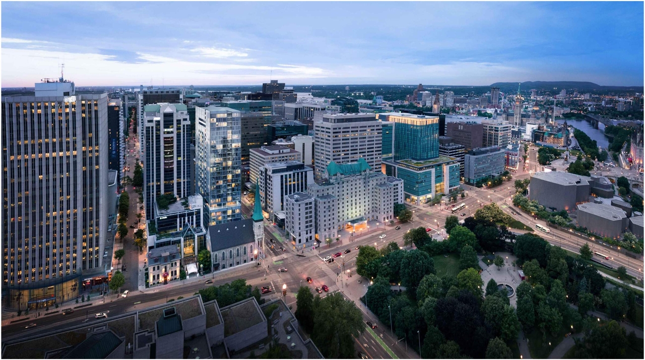 Rendering of building from page 19 of the file '2022-11-01 - Formal UDRP Presentation - D07-12-22-0128'