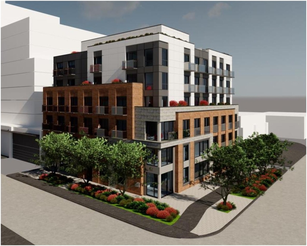 Rendering of building from page 8 of the file '2024-12-23 - Design Brief - D07-12-22-0165'