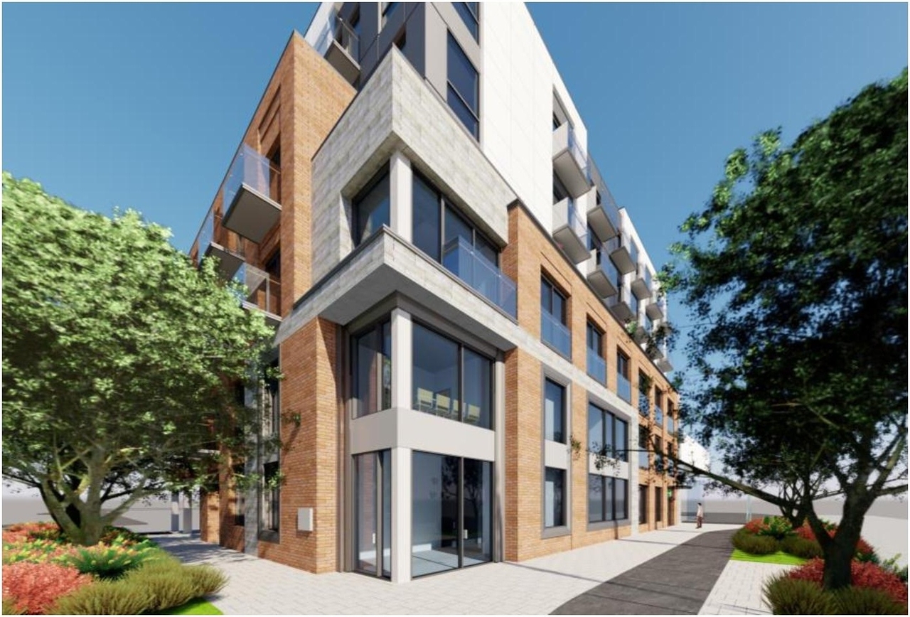 Rendering of building from page 8 of the file '2024-12-23 - Design Brief - D07-12-22-0165'