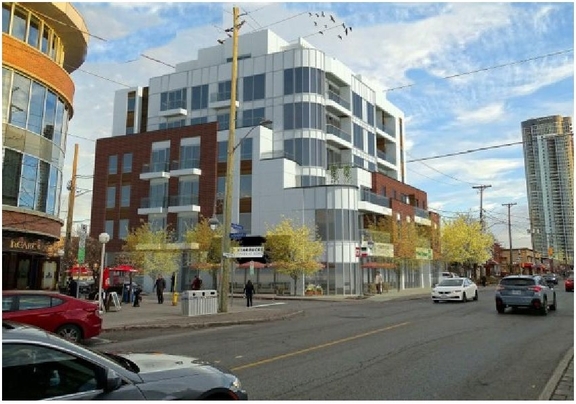 Rendering of building from page 42 of the file '2022-12-02 - Design Brief - D07-12-22-0165'