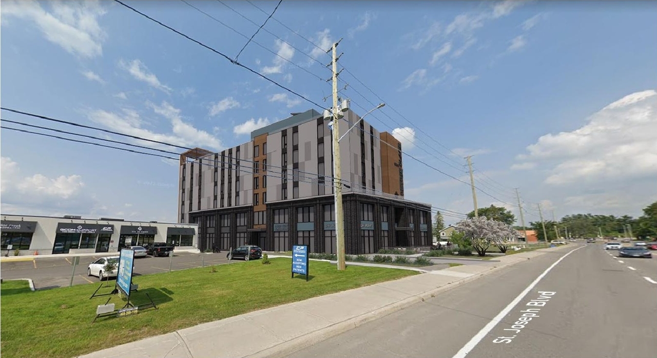 Rendering of building from page 6 of the file '2023-05-15 - Design Brief - D07-12-23-0059'